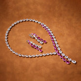 Double Row Pink Pear-Shaped Tassel Necklace Set with Simulated Diamonds in White Gold-Plated Copper