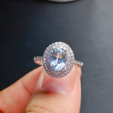 Aquamarine Oval Cut Engagement Ring with Halo in Sterling Silver and White Gold Plating