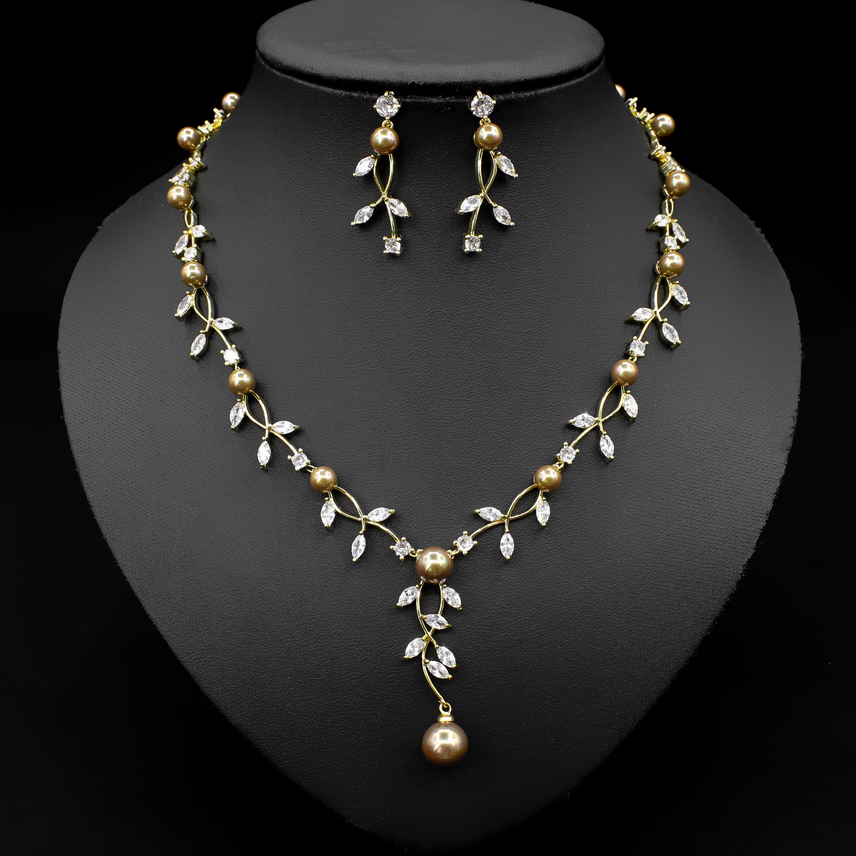 Elegant Pearl and Marquise Cut Gemstone Necklace and Earrings Set in White Gold and 18K Gold