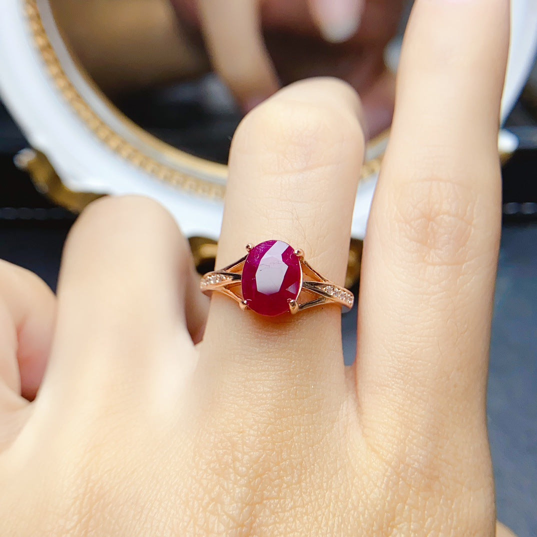 Ruby Oval Cut Engagement Ring in Sterling Silver with Accent Stones