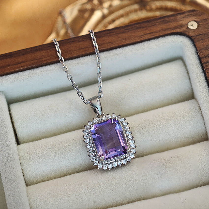 Amethyst Emerald Cut Pendant Necklace in Sterling Silver with Halo Design