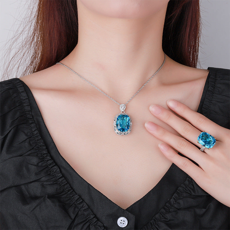 Radiant-Cut Simulated Aquamarine Jewelry Set with Solitaire and Accent Design