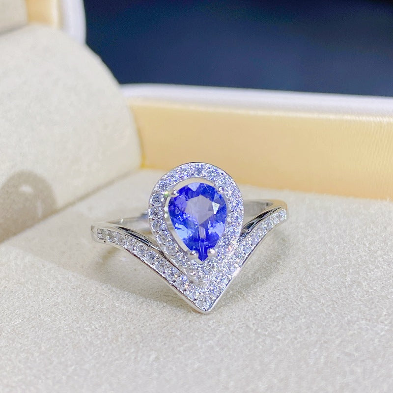 Tanzanite Pear-Shaped Engagement Ring with Accents and Halo Design in Sterling Silver