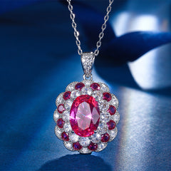 Oval-Cut Simulated Ruby Jewelry Set in White Gold-Plated Copper with Elegant Design