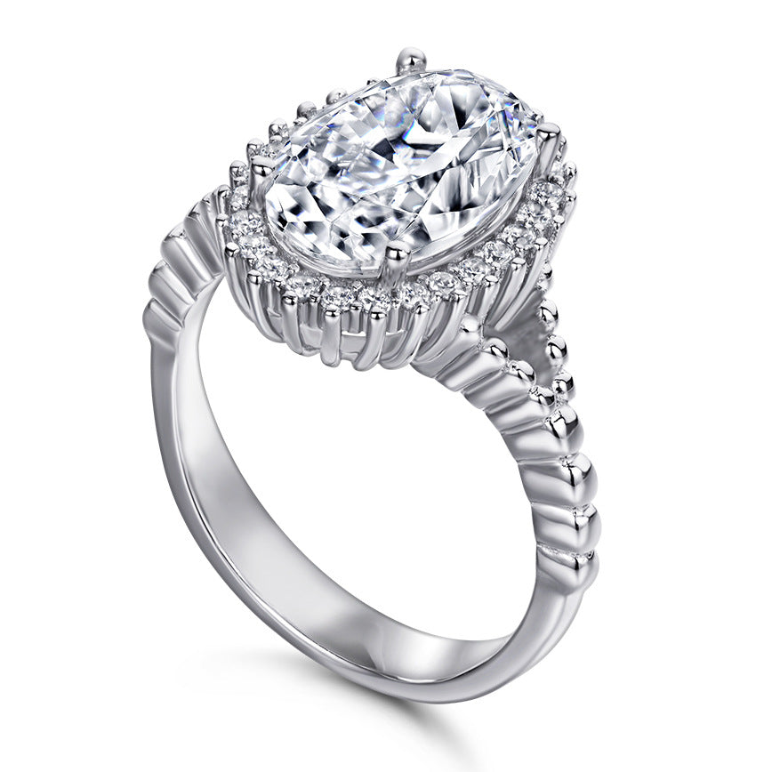 4.5-Carat Oval Cut Simulated Colorless Diamond Engagement Ring with Halo Design and 4-Prong Setting