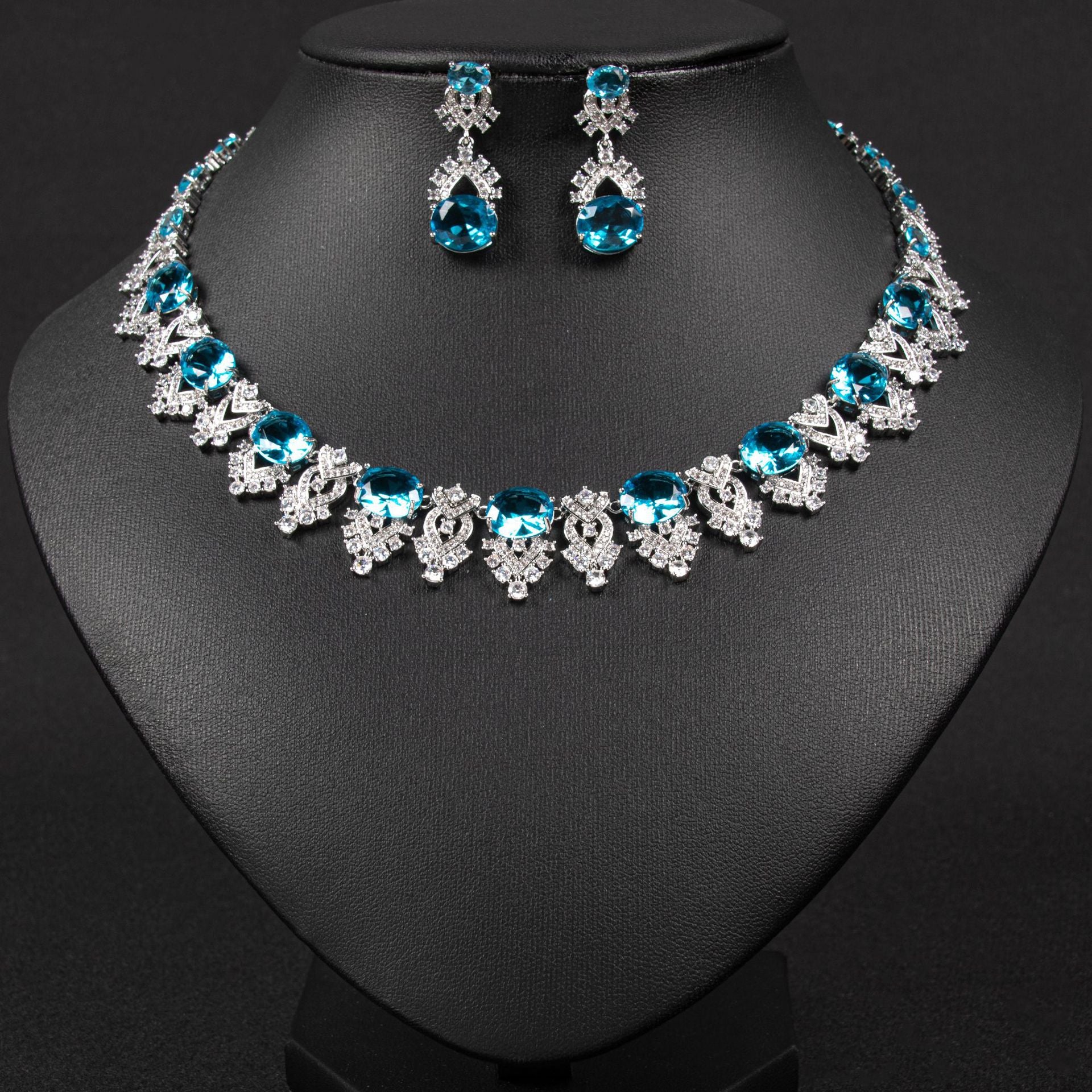 Luxury Bridal Necklace and Earrings Set with Oval Simulated Diamonds in White Gold Plating