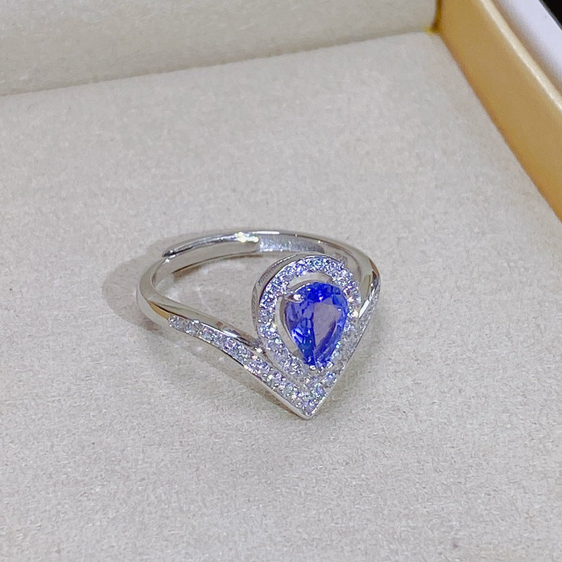 Tanzanite Pear-Shaped Engagement Ring with Accents and Halo Design in Sterling Silver