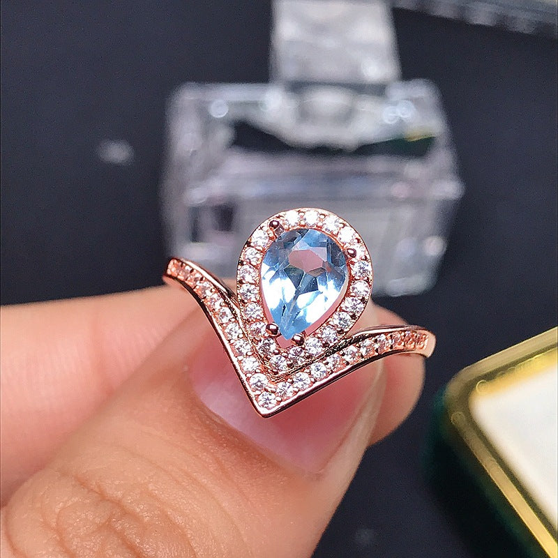 Topaz Pear Cut Engagement Ring in Sterling Silver with White and Rose Gold Plating