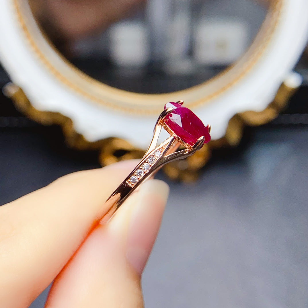 Ruby Oval Cut Engagement Ring in Sterling Silver with Accent Stones