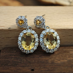 Yellow Citrine Oval Drop Earrings in Sterling Silver with Halo Design