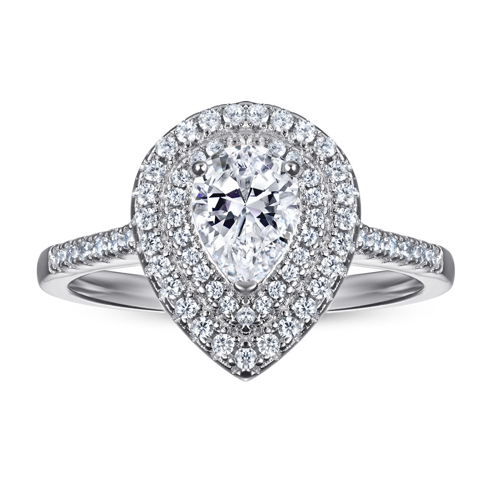 1.2-Carat Pear Cut Simulated Colorless and Pink Diamond Engagement Ring with Accents and Halo Detail