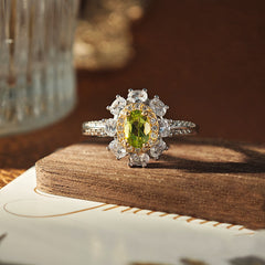 Peridot Oval Cut Engagement Ring in Sterling Silver with White Gold Plating