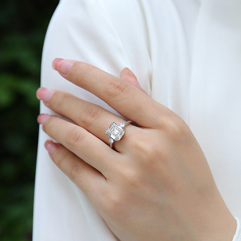 Three-Stone 3-Carat Emerald Cut Moissanite Engagement Ring in Sterling Silver with GRA Certificate