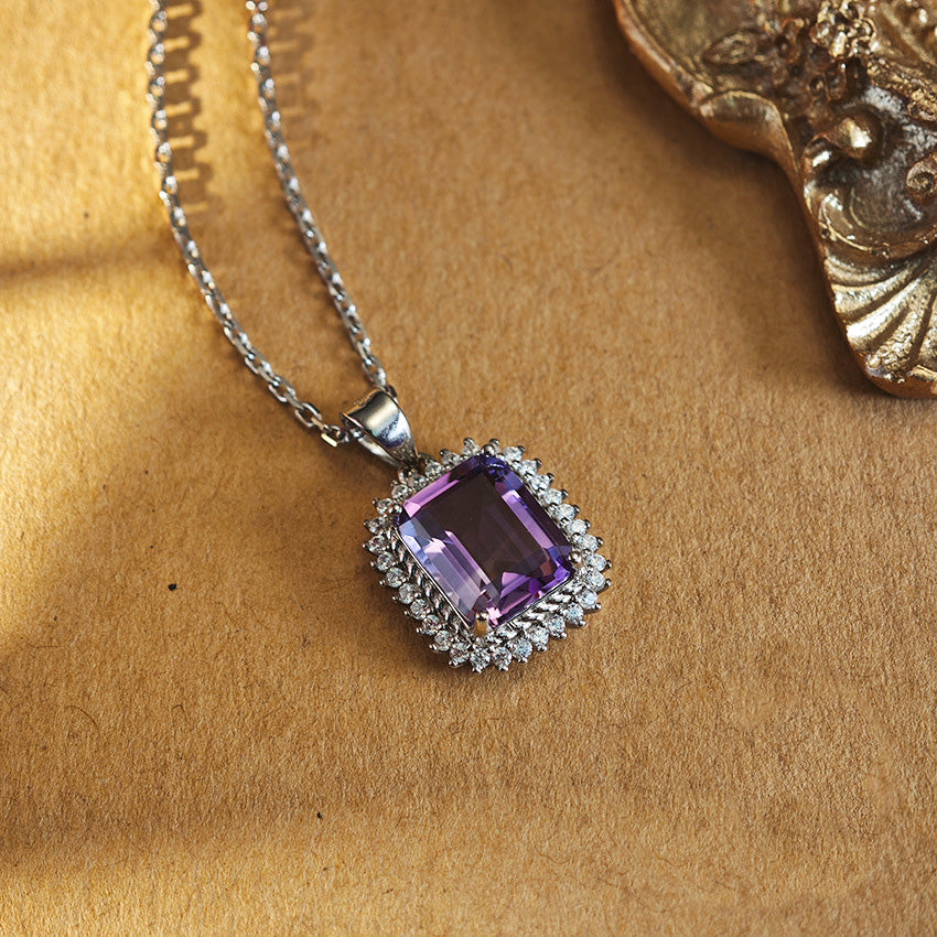 Amethyst Emerald Cut Pendant Necklace in Sterling Silver with Halo Design