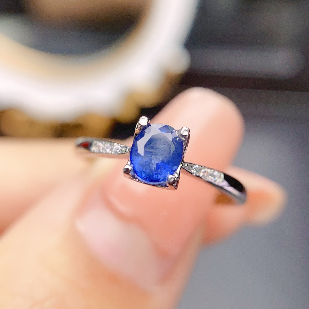 Sapphire Oval Cut Engagement Ring with Accent Stones in Sterling Silver