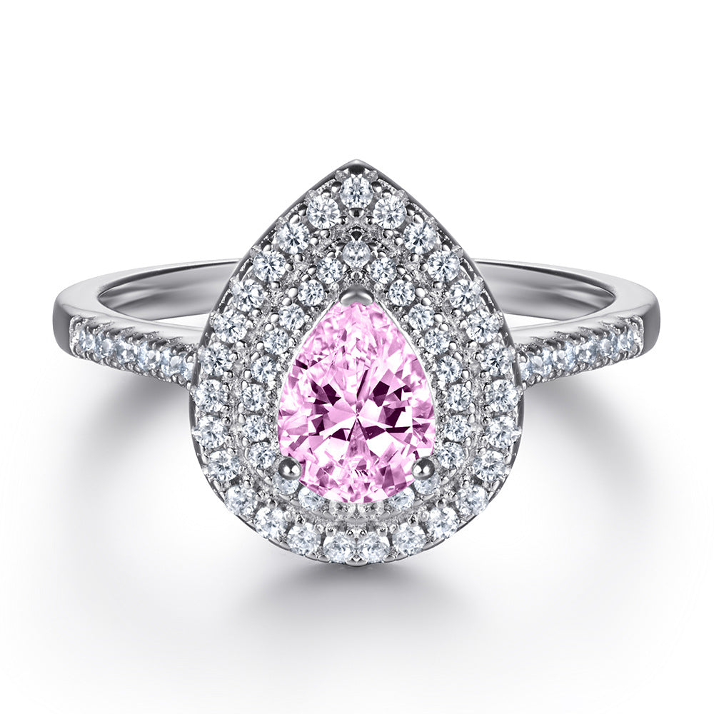 1.2-Carat Pear Cut Simulated Colorless and Pink Diamond Engagement Ring with Accents and Halo Detail