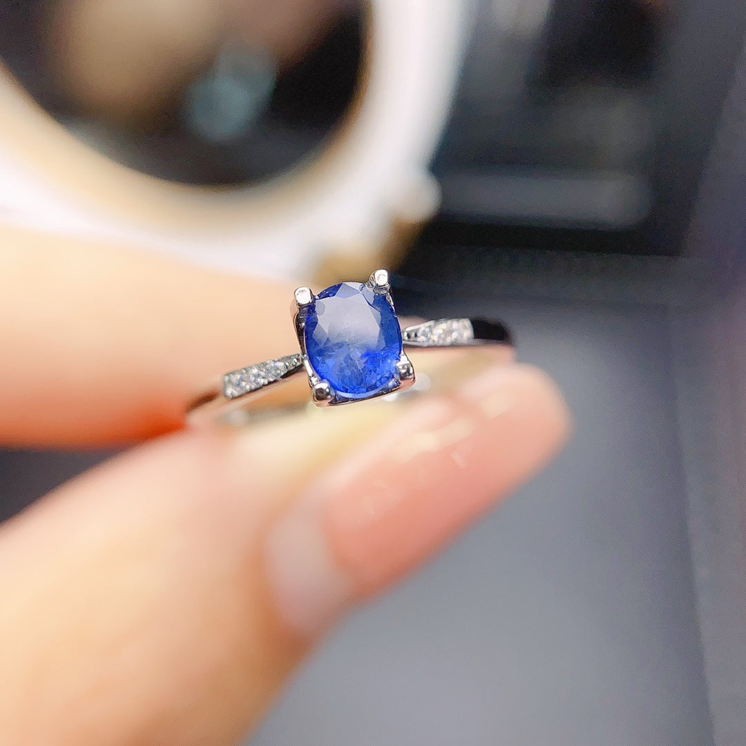 Sapphire Oval Cut Engagement Ring with Accent Stones in Sterling Silver