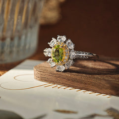 Peridot Oval Cut Engagement Ring in Sterling Silver with White Gold Plating