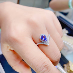 Tanzanite Pear-Shaped Engagement Ring with Accents and Halo Design in Sterling Silver