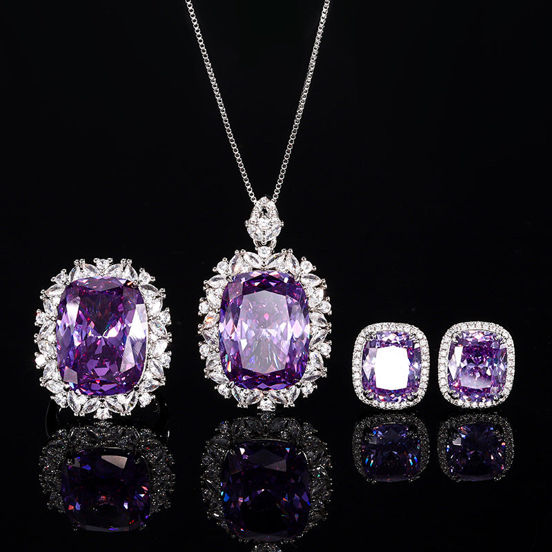 Simulated Radiant-Cut Purple Diamond Jewelry Set in White Gold-Plated Copper with Halo Design