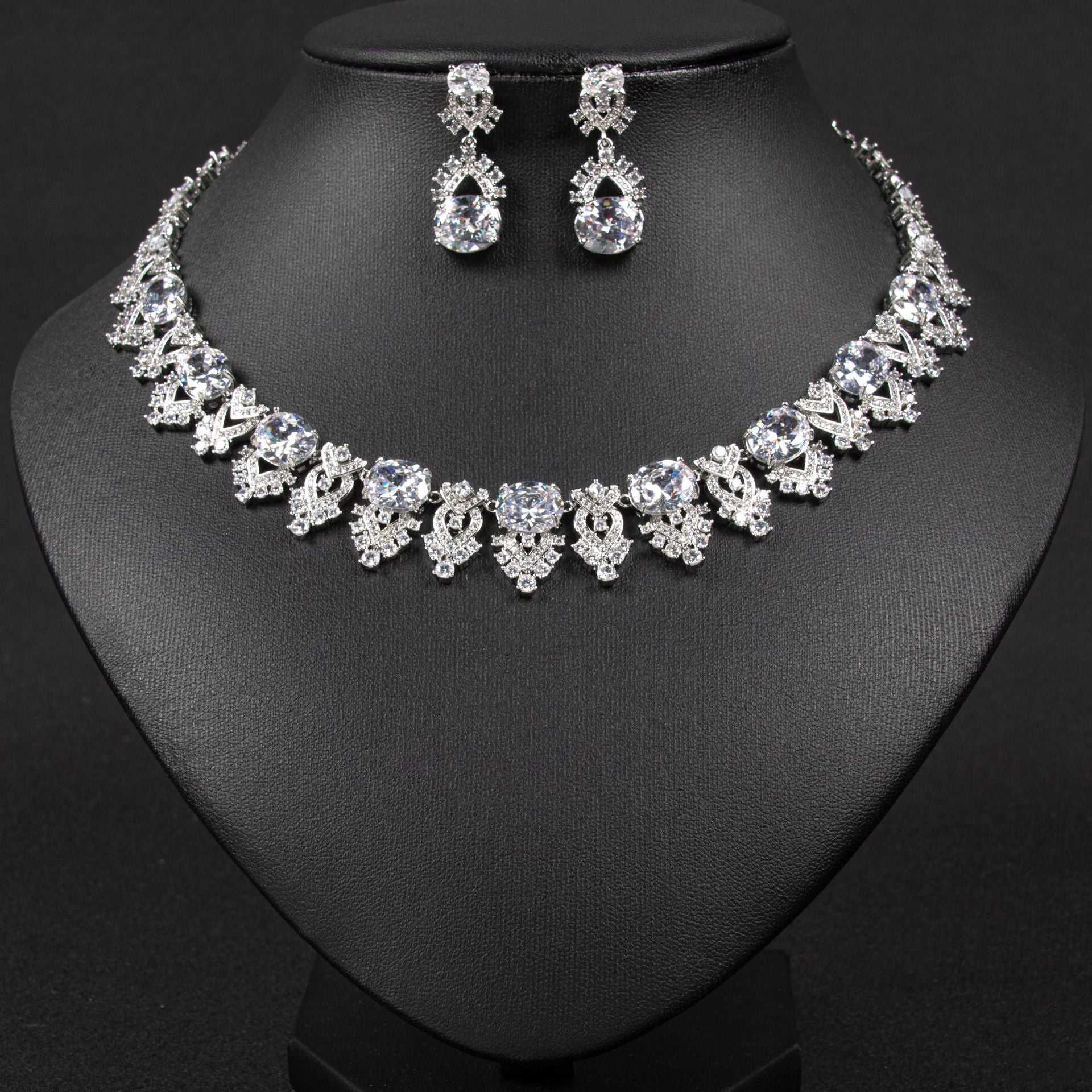 Luxury Bridal Necklace and Earrings Set with Oval Simulated Diamonds in White Gold Plating