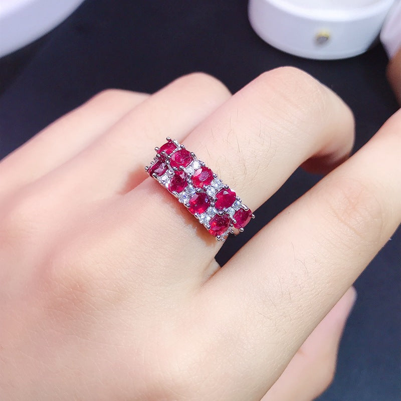 Ruby Oval Cut Wedding Band in Sterling Silver with White Gold Plating