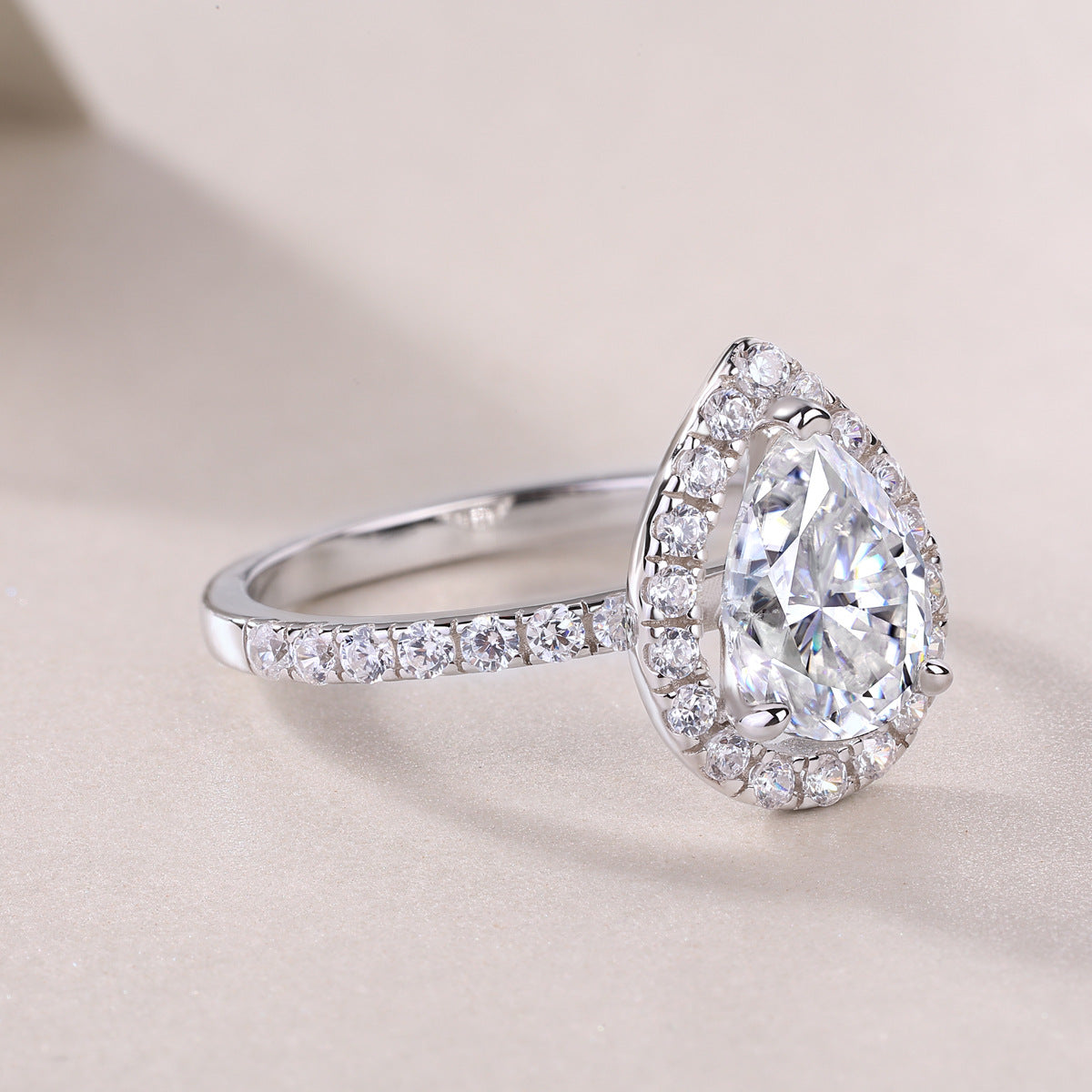 1.5-Carat Pear-Shaped Moissanite Halo Engagement Ring in White Gold-Plated Sterling Silver with GRA Certificate