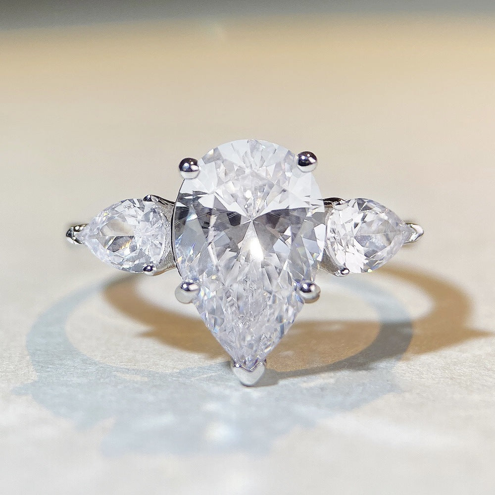 Three Stones 7.0-Carat Pear Cut Green and Colorless Simulated Diamond Engagement Ring