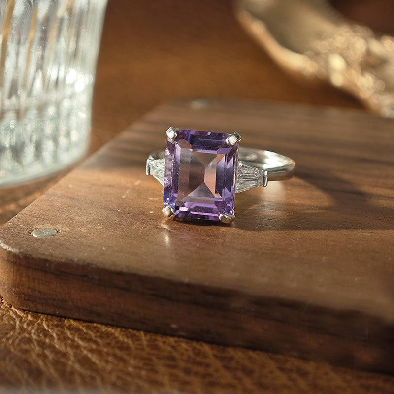 Amethyst Emerald Cut Engagement Ring with Three Stone Design in Sterling Silver and Platinum Plating