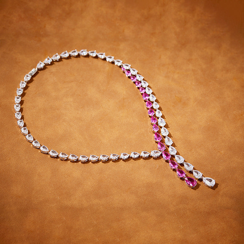 Double Row Pink Pear-Shaped Tassel Necklace Set with Simulated Diamonds in White Gold-Plated Copper