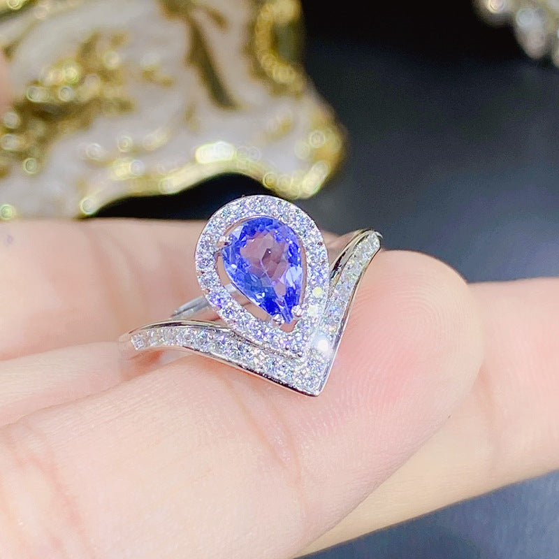 Tanzanite Pear-Shaped Engagement Ring with Accents and Halo Design in Sterling Silver