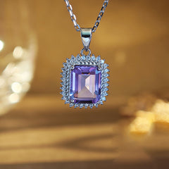 Amethyst Emerald Cut Pendant Necklace in Sterling Silver with Halo Design