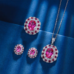 Oval-Cut Simulated Ruby Jewelry Set in White Gold-Plated Copper with Elegant Design