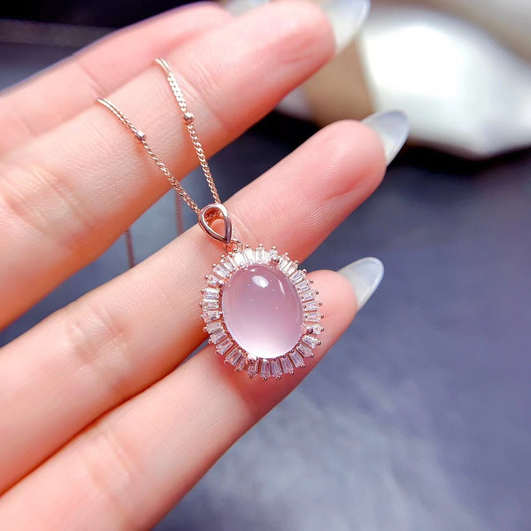 Rose Quartz Oval Cut Pendant Set in Sterling Silver with White Gold and Rose Gold Plating