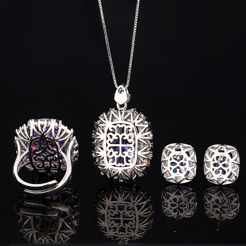 Simulated Radiant-Cut Purple Diamond Jewelry Set in White Gold-Plated Copper with Halo Design