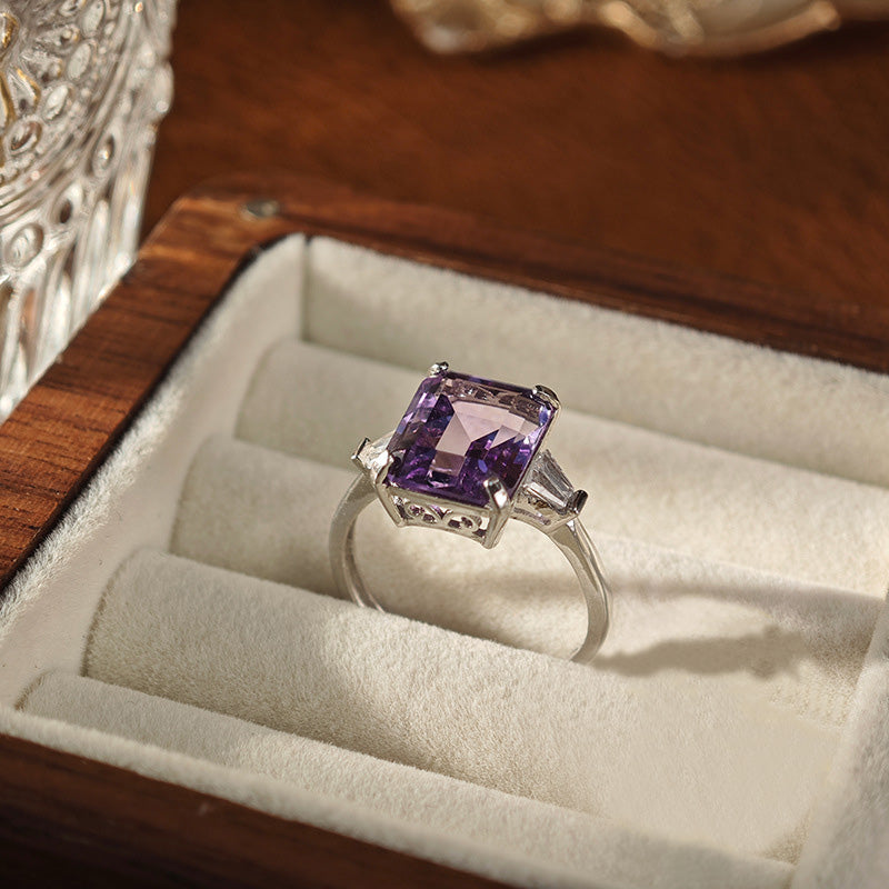 Amethyst Emerald Cut Engagement Ring with Three Stone Design in Sterling Silver and Platinum Plating