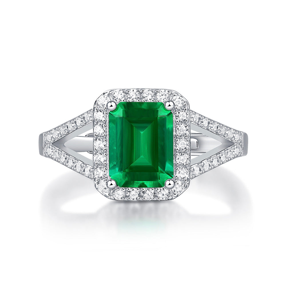 1.5-Carat Emerald Cut Simulated Emerald Engagement Ring with Halo Design