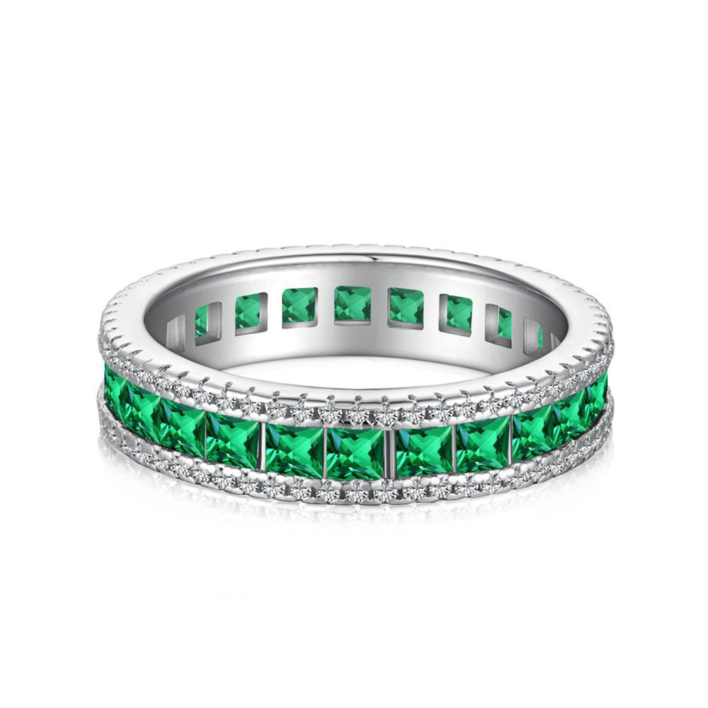 Princess Cut Simulated Diamond Wedding Band in White Gold-Plated Sterling Silver with Emerald Stone