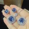 Cushion-Cut Simulated Blue Gemstone Jewelry Set in White Gold-Plated Copper with Halo Design