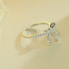 Pear Cut Simulated Colorless Diamond Bow Design Engagement Ring